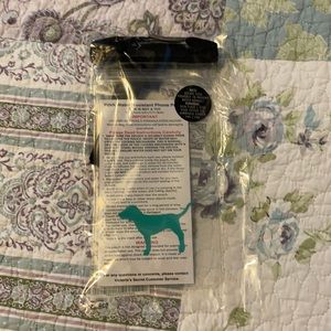 PINK sealed phone holder.